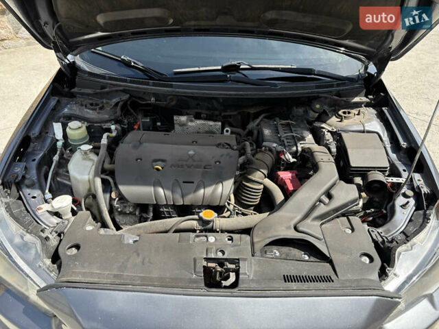 Сірий Міцубісі Lancer, об'ємом двигуна 2 л та пробігом 194 тис. км за 6500 $, фото 10 на Automoto.ua
