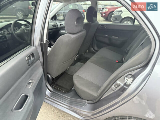Сірий Міцубісі Lancer, об'ємом двигуна 0 л та пробігом 62 тис. км за 7250 $, фото 10 на Automoto.ua