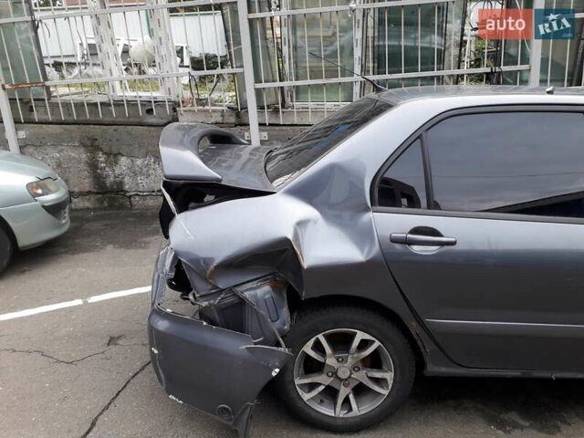 Міцубісі Lancer 2009 у Києві на Automoto.ua Сірий Міцубісі Lancer, об'ємом двигуна 1.6 л та пробігом 191 тис. км за 1500 $, фото 2 на Automoto.ua