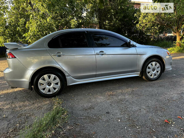 Сірий Міцубісі Lancer, об'ємом двигуна 2 л та пробігом 109 тис. км за 8500 $, фото 5 на Automoto.ua