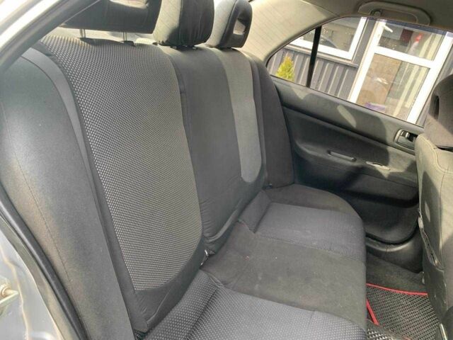 Серый Мицубиси Лансер, объемом двигателя 1.6 л и пробегом 227 тыс. км за 3599 $, фото 17 на Automoto.ua