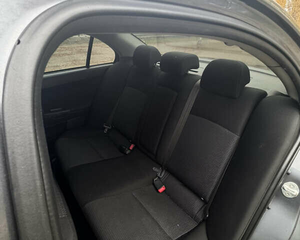 Серый Мицубиси Лансер, объемом двигателя 1.5 л и пробегом 116 тыс. км за 6000 $, фото 13 на Automoto.ua