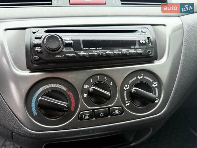 Сірий Міцубісі Lancer, об'ємом двигуна 0 л та пробігом 62 тис. км за 7250 $, фото 19 на Automoto.ua