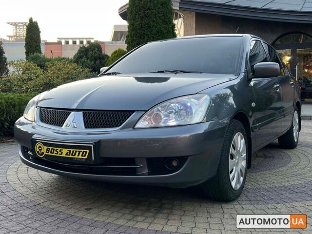 Сірий Міцубісі Lancer, об'ємом двигуна 1.6 л та пробігом 166 тис. км за 5400 $, фото 2 на Automoto.ua