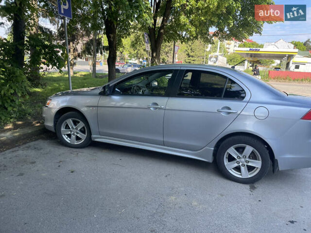Серый Мицубиси Лансер, объемом двигателя 2 л и пробегом 143 тыс. км за 6850 $, фото 2 на Automoto.ua