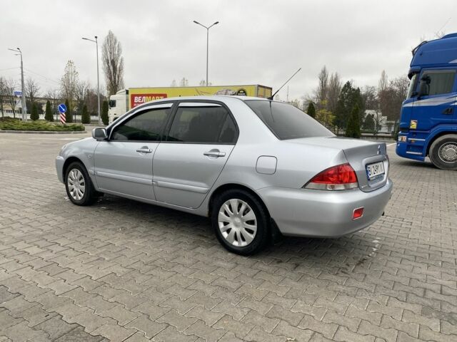 Сірий Міцубісі Lancer, об'ємом двигуна 1.6 л та пробігом 240 тис. км за 4650 $, фото 4 на Automoto.ua