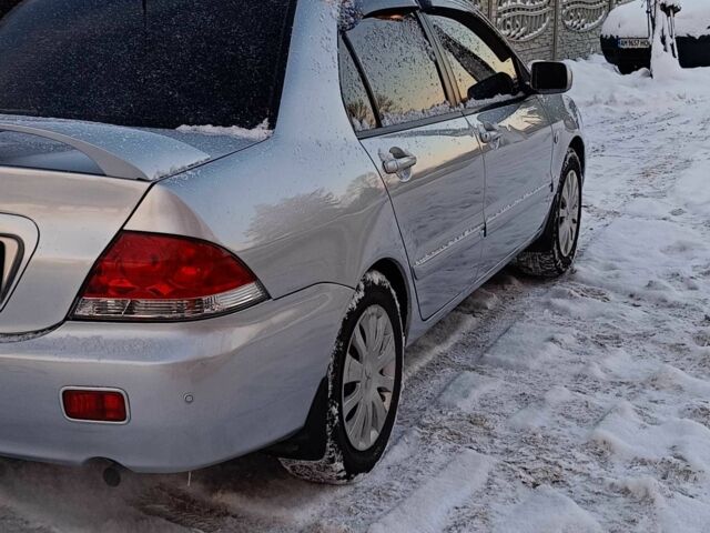 Серый Мицубиси Лансер, объемом двигателя 1.6 л и пробегом 180 тыс. км за 4750 $, фото 6 на Automoto.ua