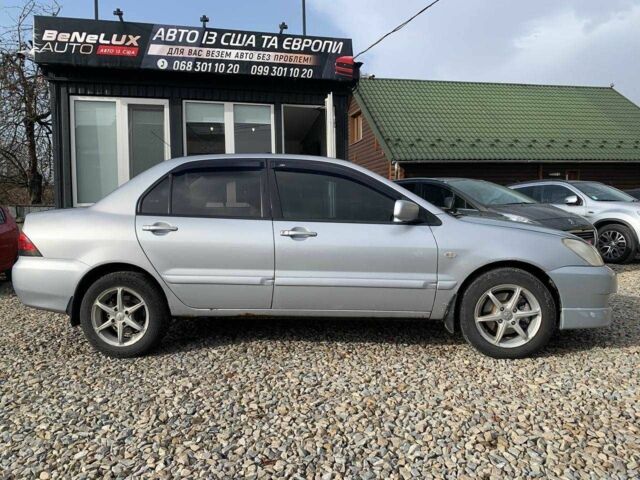 Серый Мицубиси Лансер, объемом двигателя 1.6 л и пробегом 227 тыс. км за 3599 $, фото 2 на Automoto.ua