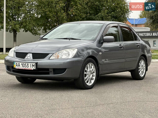 Сірий Міцубісі Lancer, об'ємом двигуна 1.58 л та пробігом 94 тис. км за 6500 $, фото 8 на Automoto.ua