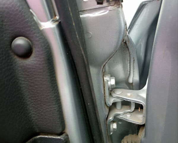 Серый Мицубиси Лансер, объемом двигателя 1.58 л и пробегом 227 тыс. км за 6200 $, фото 8 на Automoto.ua