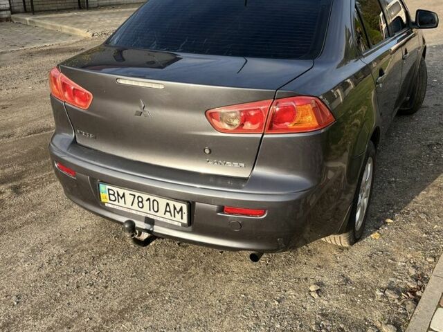 Сірий Міцубісі Lancer, об'ємом двигуна 1.5 л та пробігом 236 тис. км за 6000 $, фото 4 на Automoto.ua