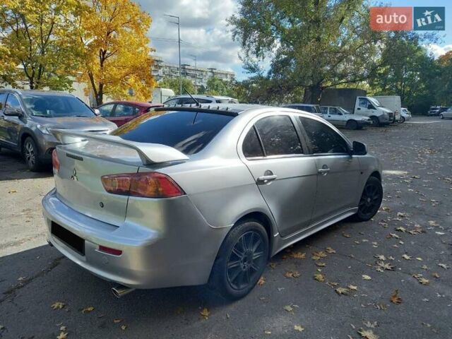 Серый Мицубиси Лансер, объемом двигателя 2 л и пробегом 296 тыс. км за 5500 $, фото 13 на Automoto.ua