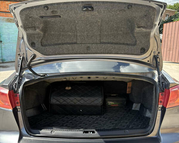 Сірий Міцубісі Lancer, об'ємом двигуна 2 л та пробігом 194 тис. км за 6900 $, фото 10 на Automoto.ua