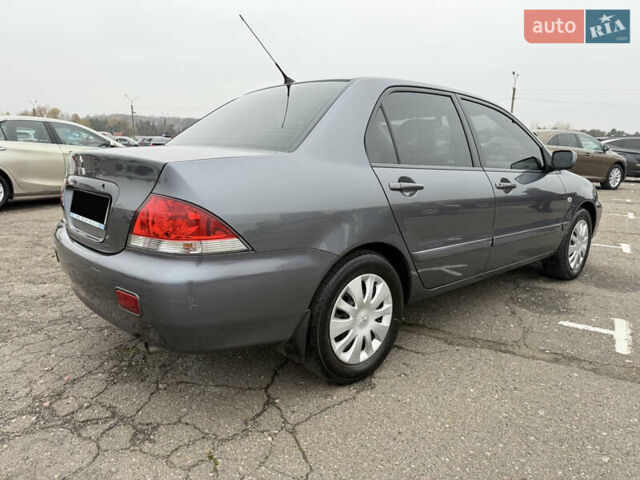 Сірий Міцубісі Lancer, об'ємом двигуна 0 л та пробігом 62 тис. км за 7250 $, фото 2 на Automoto.ua