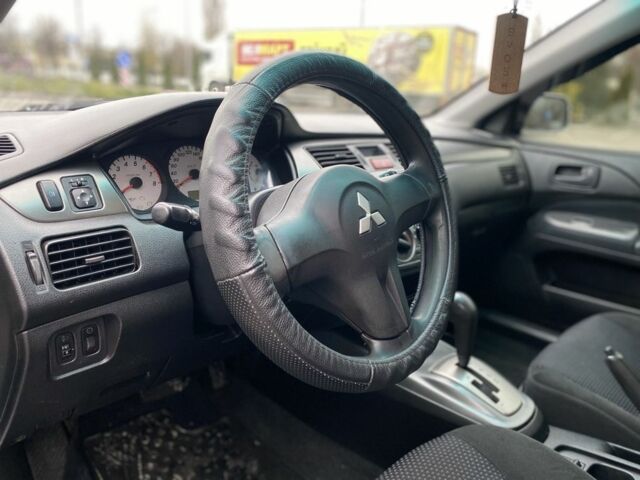 Сірий Міцубісі Lancer, об'ємом двигуна 1.6 л та пробігом 240 тис. км за 4650 $, фото 10 на Automoto.ua