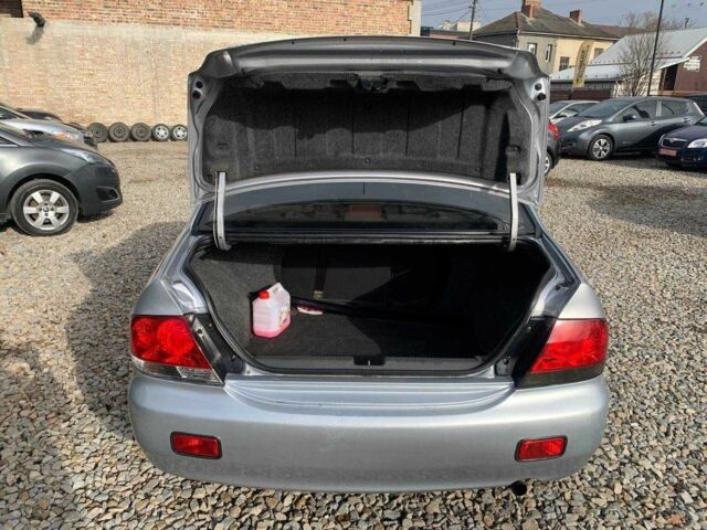 Серый Мицубиси Лансер, объемом двигателя 1.6 л и пробегом 227 тыс. км за 3599 $, фото 19 на Automoto.ua