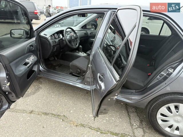 Сірий Міцубісі Lancer, об'ємом двигуна 0 л та пробігом 62 тис. км за 7250 $, фото 11 на Automoto.ua