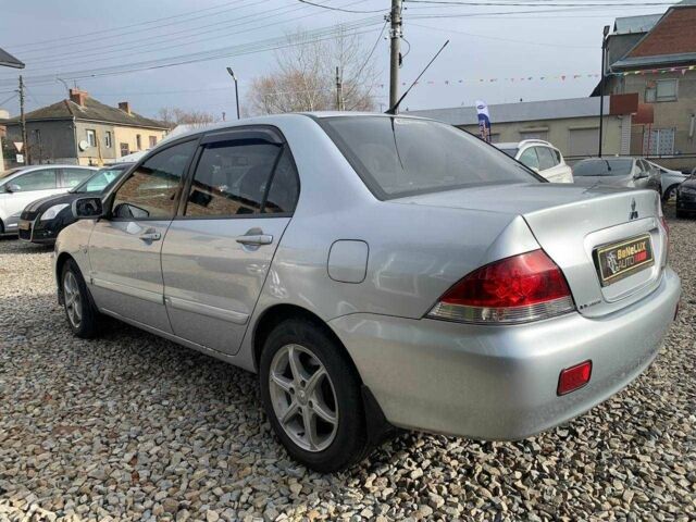 Серый Мицубиси Лансер, объемом двигателя 1.6 л и пробегом 227 тыс. км за 3599 $, фото 5 на Automoto.ua