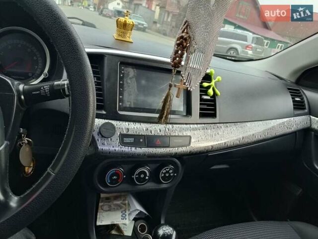 Серый Мицубиси Лансер, объемом двигателя 1.5 л и пробегом 304 тыс. км за 5200 $, фото 6 на Automoto.ua