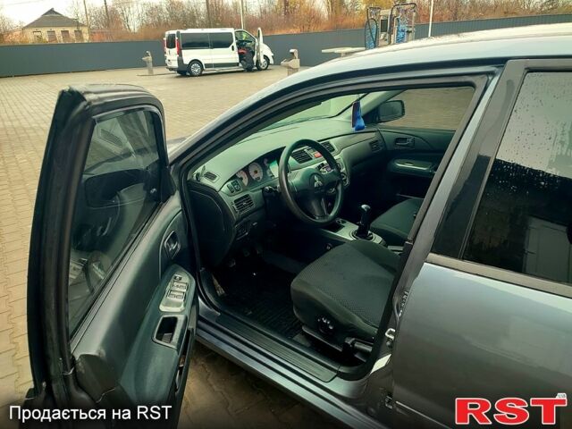 Сірий Міцубісі Lancer, об'ємом двигуна 1.6 л та пробігом 197 тис. км за 3600 $, фото 4 на Automoto.ua