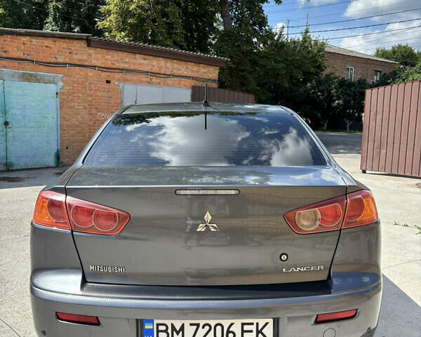 Сірий Міцубісі Lancer, об'ємом двигуна 2 л та пробігом 194 тис. км за 6500 $, фото 5 на Automoto.ua