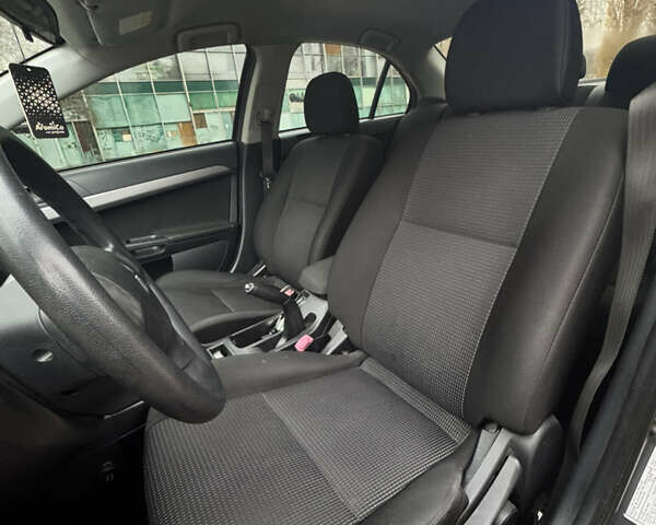 Серый Мицубиси Лансер, объемом двигателя 1.5 л и пробегом 116 тыс. км за 6000 $, фото 10 на Automoto.ua