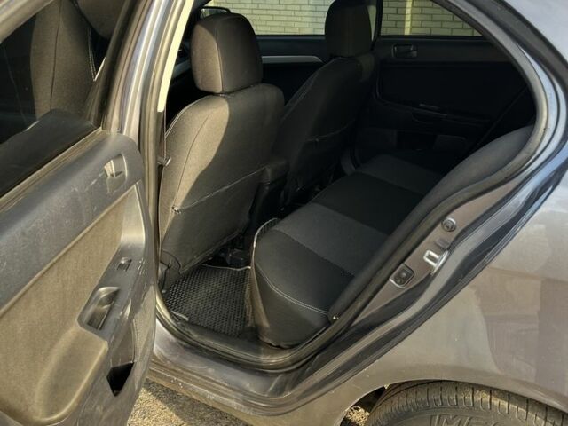 Сірий Міцубісі Lancer, об'ємом двигуна 1.5 л та пробігом 236 тис. км за 6000 $, фото 7 на Automoto.ua