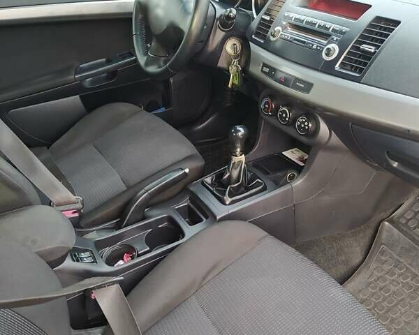 Сірий Міцубісі Lancer, об'ємом двигуна 1.5 л та пробігом 217 тис. км за 6100 $, фото 16 на Automoto.ua