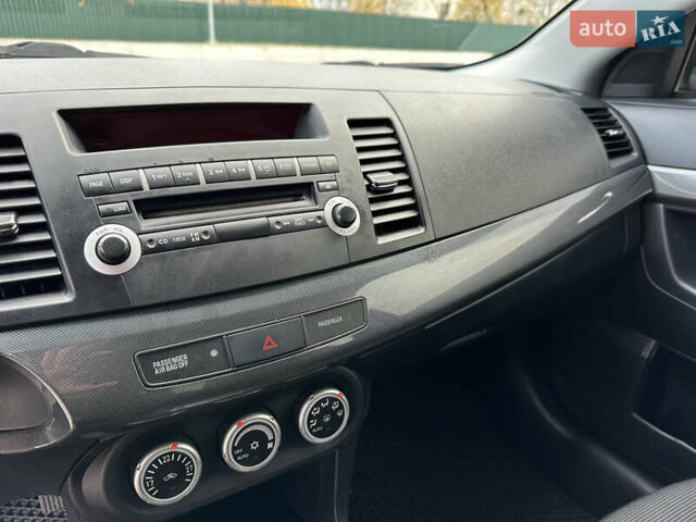 Сірий Міцубісі Lancer, об'ємом двигуна 2 л та пробігом 103 тис. км за 7500 $, фото 22 на Automoto.ua
