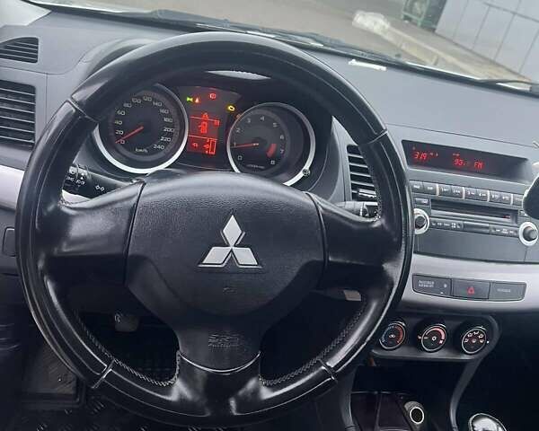 Серый Мицубиси Лансер, объемом двигателя 1.5 л и пробегом 190 тыс. км за 5800 $, фото 8 на Automoto.ua