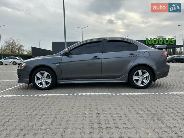 Сірий Міцубісі Lancer, об'ємом двигуна 2 л та пробігом 103 тис. км за 7500 $, фото 7 на Automoto.ua