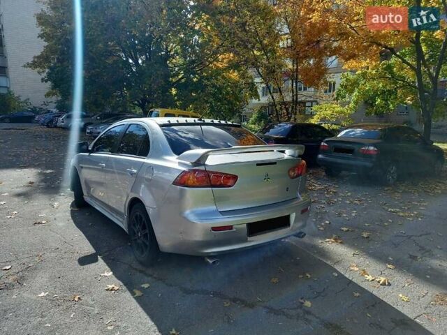 Серый Мицубиси Лансер, объемом двигателя 2 л и пробегом 296 тыс. км за 5500 $, фото 11 на Automoto.ua