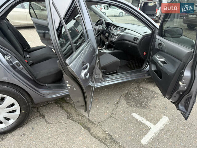 Сірий Міцубісі Lancer, об'ємом двигуна 0 л та пробігом 62 тис. км за 7250 $, фото 18 на Automoto.ua