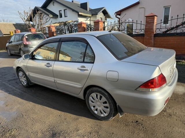 Сірий Міцубісі Lancer, об'ємом двигуна 1.6 л та пробігом 230 тис. км за 3400 $, фото 6 на Automoto.ua