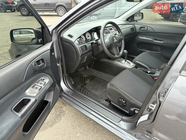 Сірий Міцубісі Lancer, об'ємом двигуна 0 л та пробігом 62 тис. км за 7250 $, фото 5 на Automoto.ua