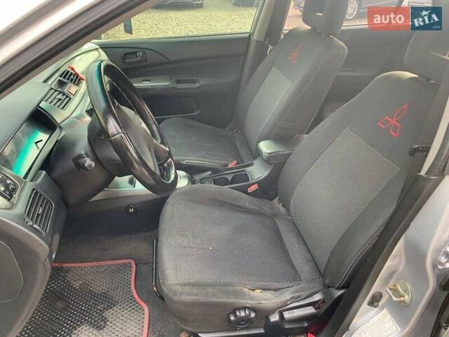 Серый Мицубиси Лансер, объемом двигателя 1.58 л и пробегом 227 тыс. км за 3599 $, фото 20 на Automoto.ua