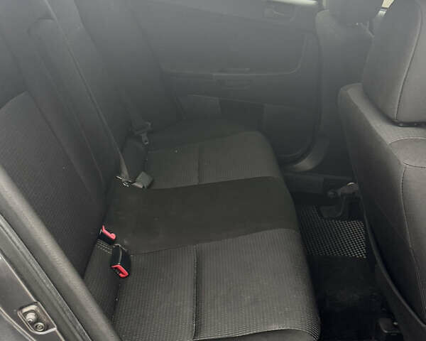 Серый Мицубиси Лансер, объемом двигателя 1.5 л и пробегом 116 тыс. км за 6000 $, фото 12 на Automoto.ua