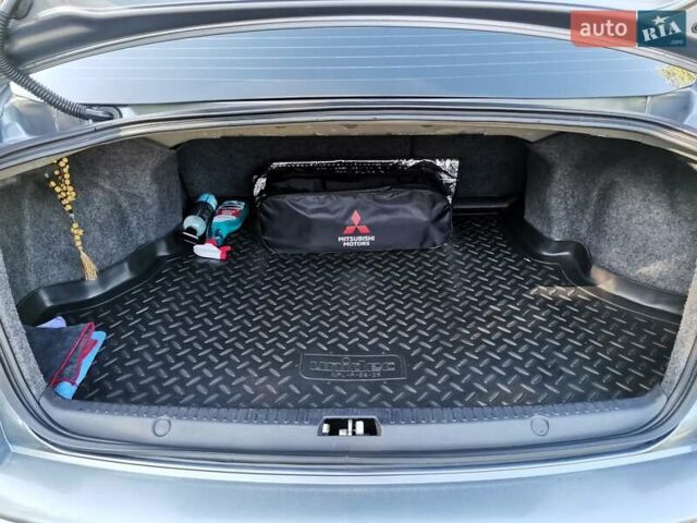 Серый Мицубиси Лансер, объемом двигателя 1.5 л и пробегом 183 тыс. км за 5900 $, фото 7 на Automoto.ua
