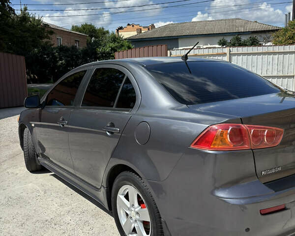 Сірий Міцубісі Lancer, об'ємом двигуна 2 л та пробігом 194 тис. км за 6500 $, фото 6 на Automoto.ua