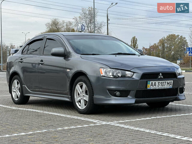Сірий Міцубісі Lancer, об'ємом двигуна 2 л та пробігом 103 тис. км за 7500 $, фото 2 на Automoto.ua