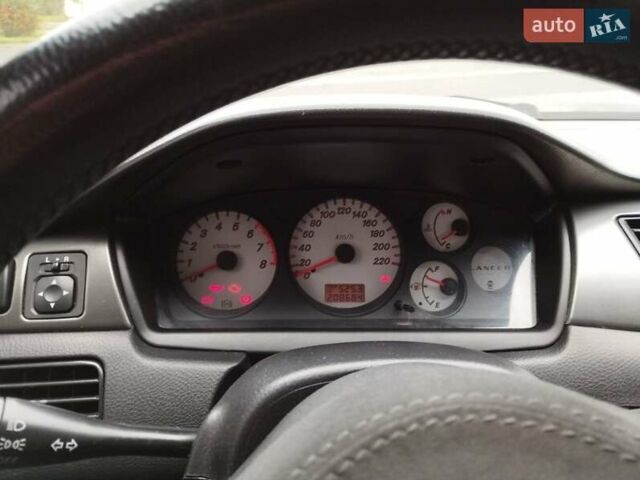 Сірий Міцубісі Lancer, об'ємом двигуна 1.58 л та пробігом 209 тис. км за 2900 $, фото 15 на Automoto.ua