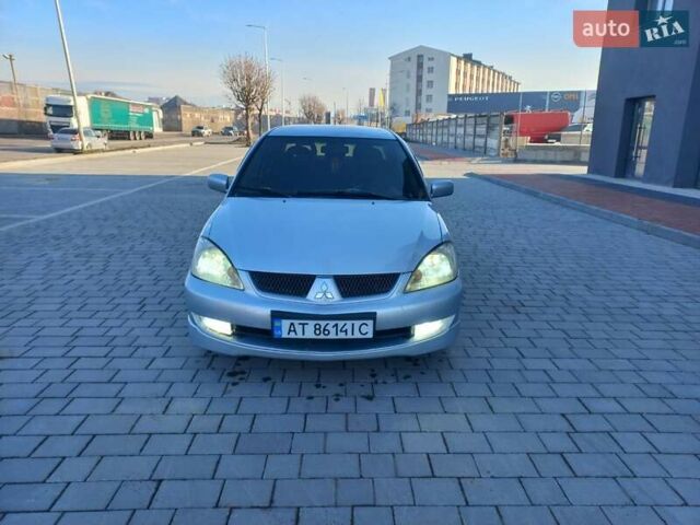 Серый Мицубиси Лансер, объемом двигателя 1.6 л и пробегом 228 тыс. км за 2999 $, фото 4 на Automoto.ua