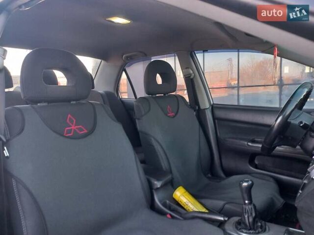 Серый Мицубиси Лансер, объемом двигателя 1.6 л и пробегом 228 тыс. км за 2999 $, фото 31 на Automoto.ua