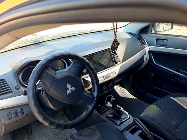 Сірий Міцубісі Lancer, об'ємом двигуна 1.5 л та пробігом 166 тис. км за 6000 $, фото 1 на Automoto.ua