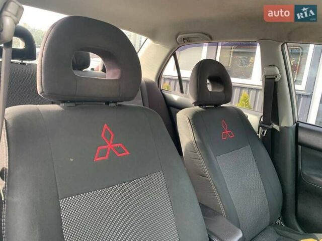 Серый Мицубиси Лансер, объемом двигателя 1.58 л и пробегом 227 тыс. км за 3599 $, фото 14 на Automoto.ua