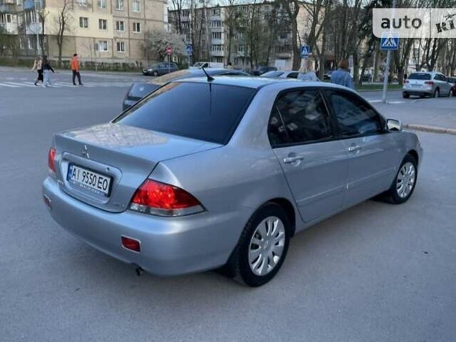 Сірий Міцубісі Lancer, об'ємом двигуна 1.6 л та пробігом 188 тис. км за 5650 $, фото 3 на Automoto.ua