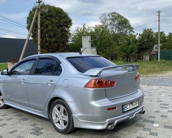 Серый Мицубиси Лансер, объемом двигателя 1.5 л и пробегом 303 тыс. км за 4900 $, фото 19 на Automoto.ua