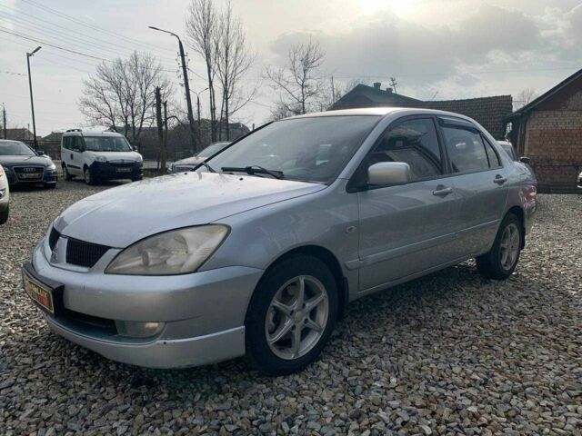 Серый Мицубиси Лансер, объемом двигателя 1.6 л и пробегом 227 тыс. км за 3599 $, фото 7 на Automoto.ua