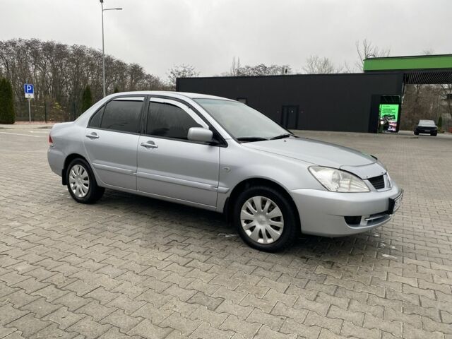 Сірий Міцубісі Lancer, об'ємом двигуна 1.6 л та пробігом 240 тис. км за 4650 $, фото 9 на Automoto.ua