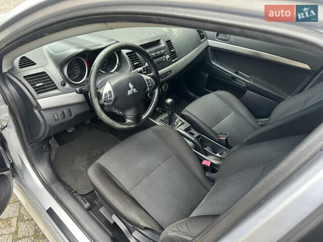 Сірий Міцубісі Lancer, об'ємом двигуна 2 л та пробігом 195 тис. км за 5200 $, фото 7 на Automoto.ua